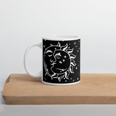 White Ceramic 11oz Mug with Black Background and Sun & Moon Kissing Design